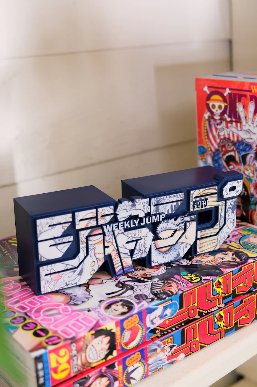 Shonen Jump Store Exclusive: Weekly Shonen JUMP Magazine Logo Statue - One Piece 'Gear 5' Edition